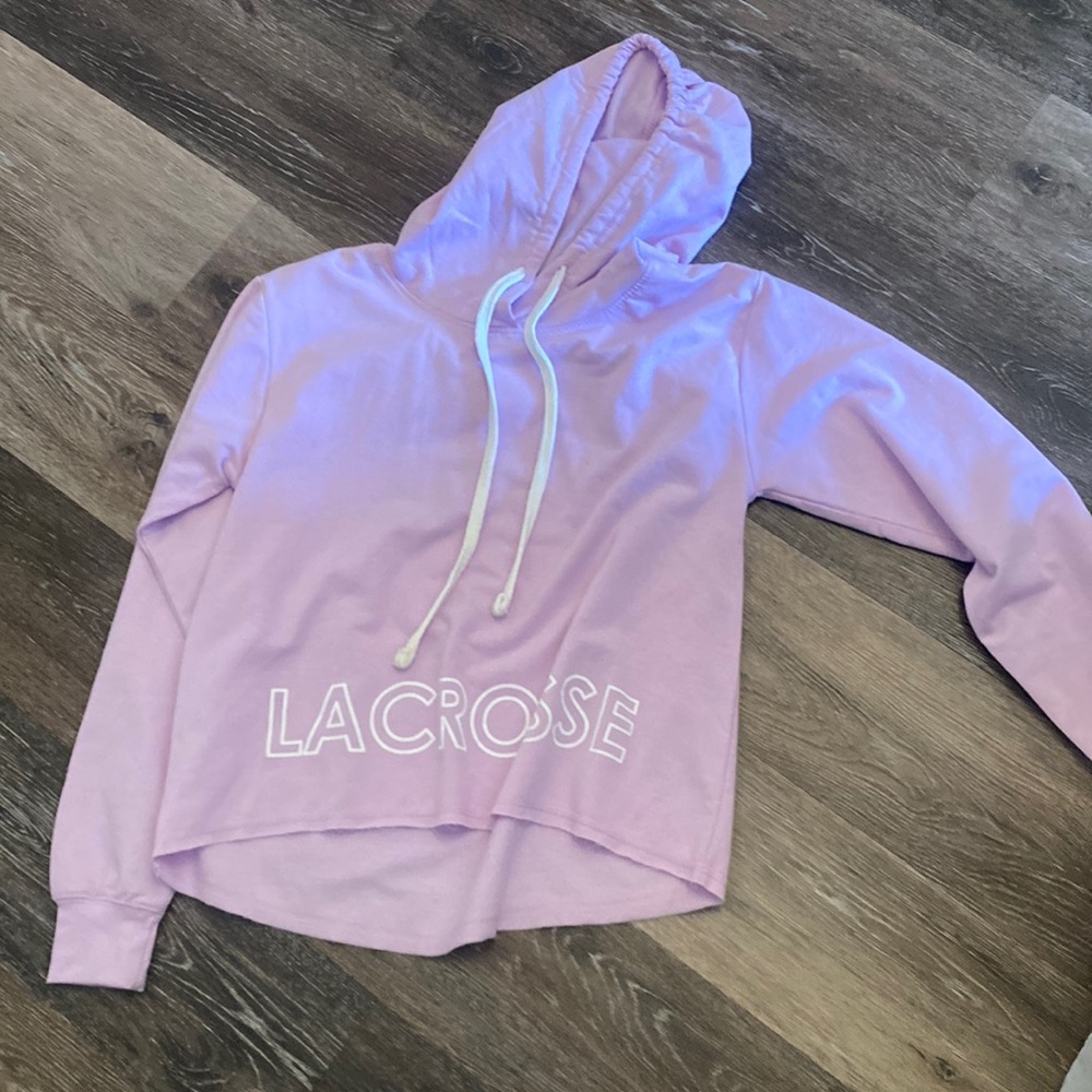 Light weight slightly cropped lavender hoodie, with white lettering on bottom.